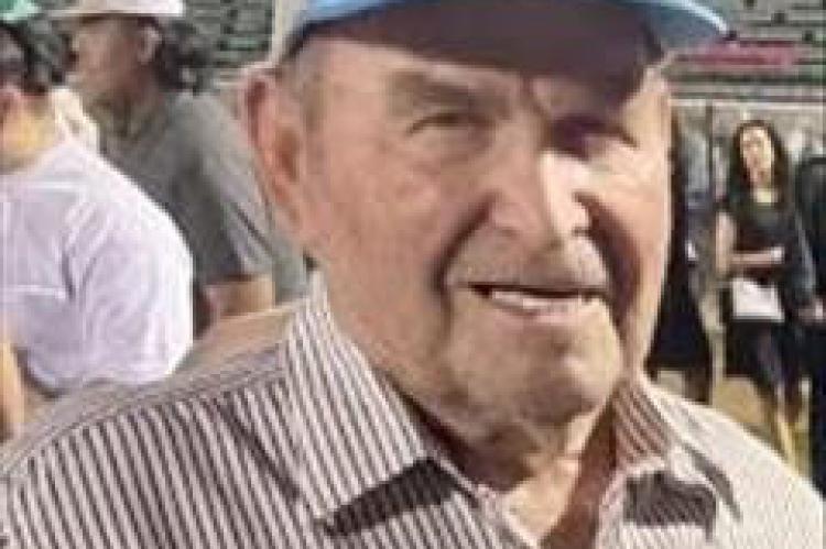 Elmer “Ray” Woods