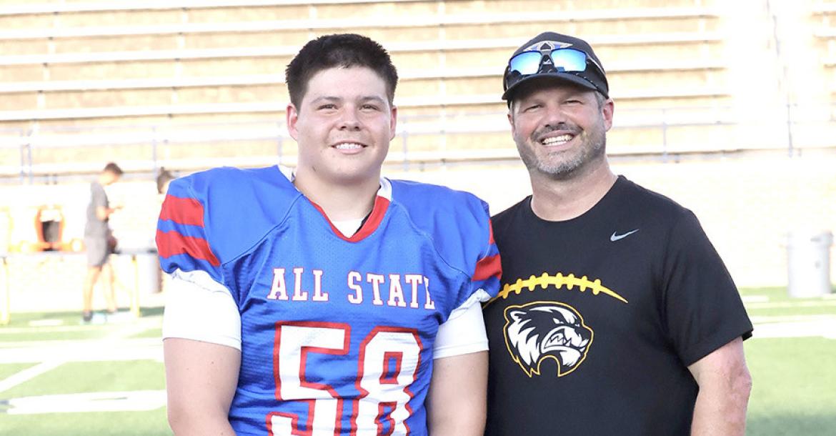 Wolverine All-State Lineman, Alyc Harjo, and Holdenville Head Coach, David Barker were introduced during the pre-game ceremony at the OCA All-State Game.
