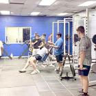 Summer Pride boys make good use of the weight facility which bears Coach Rawls’ name.