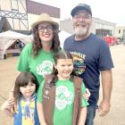 Members of Girl Scout Troup 7660 were impressed by many of the old cars this year. Pictured with mom and dad local business owners Cameron and Alicia Miller are Presley and August.