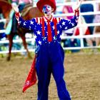 Big Hat Roxy was a feature entertainer at the Holdenville Round-Up Club Rodeo. Roxy is just 16 and is an emerging talent in his field. There’s always some pauses in the arena while the action moves from one event to another and Roxy made those pauses seem short with his jokes and routines.