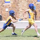 The chase is on....Two Wolverines had a bit of a game of chase going on in one of the football team’s Spring drills.