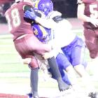 The best pass defense is to sack the quarterback before he can release the pass! These two Wolverine defenders put the Wampus Cat quarterback on the ground before he could throw.